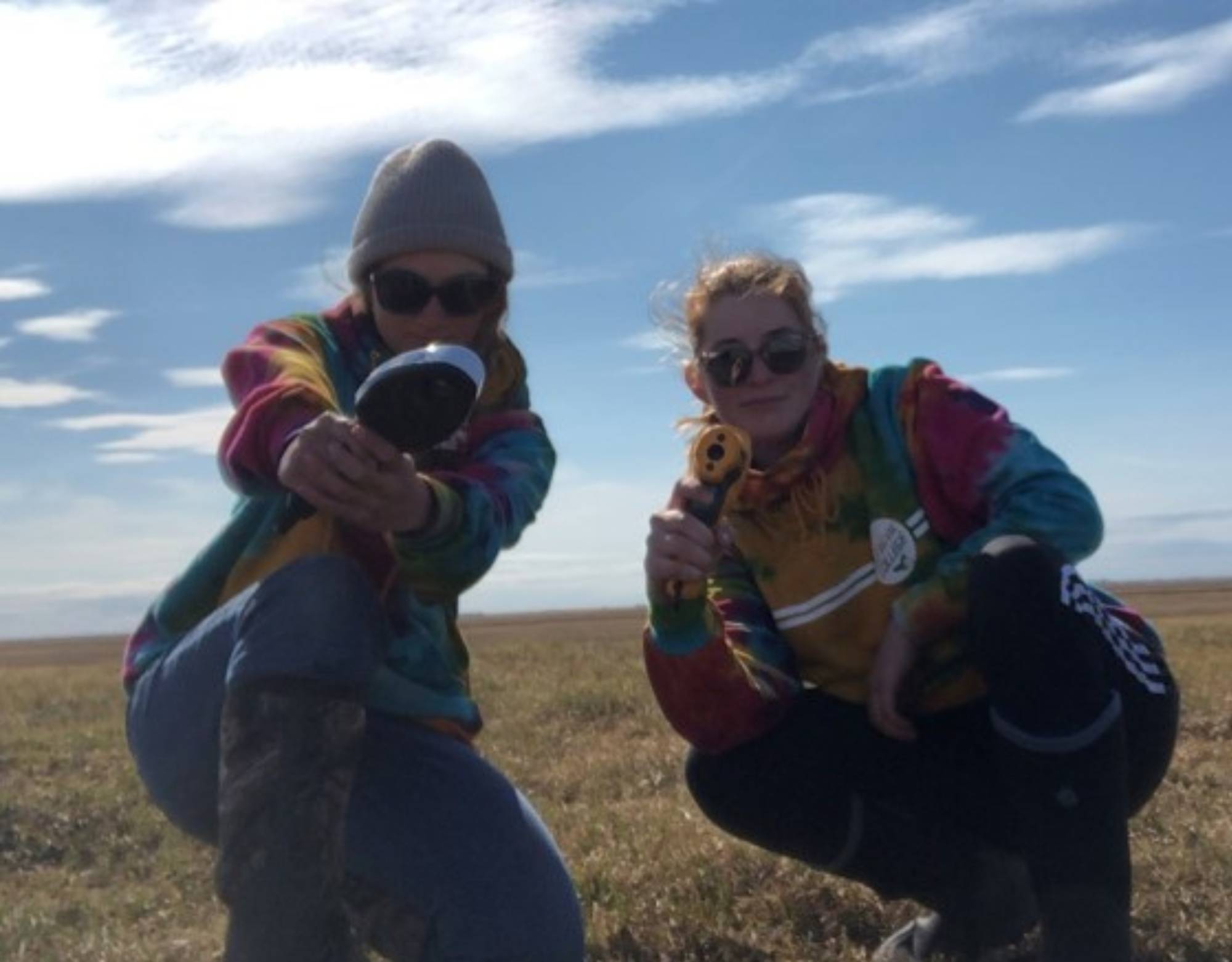 Emma and Jenna collect NDVI and IR measurements at Utqiagvik